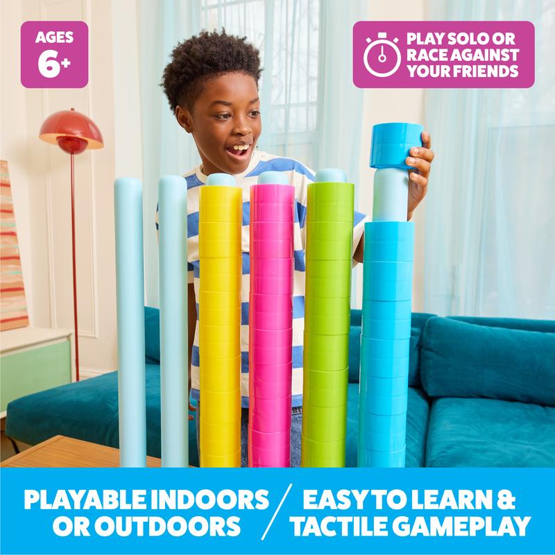 Kid playing Giant Color Stack indoors